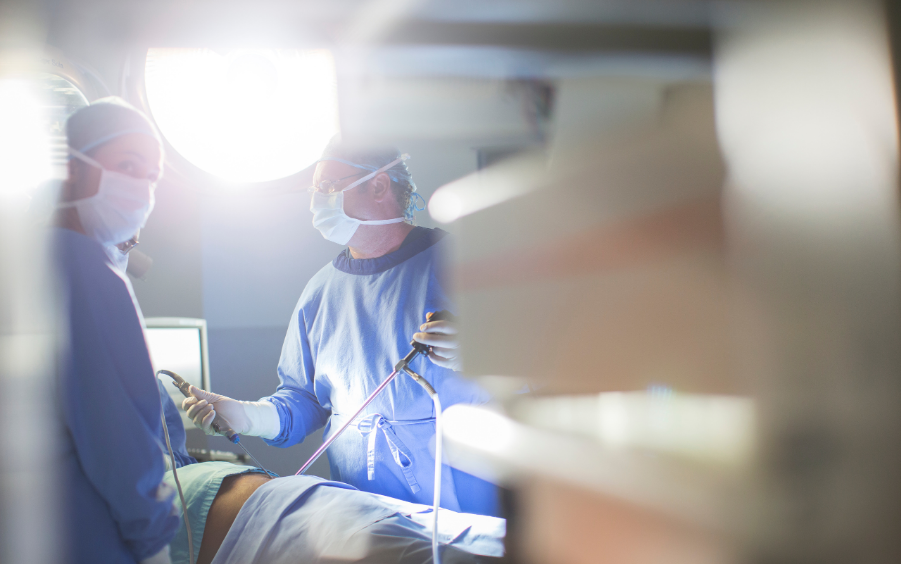 Surgeons performing keyhole cosmetic surgery